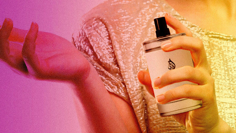 Person holding a perfume bottle with a colorful gradient background